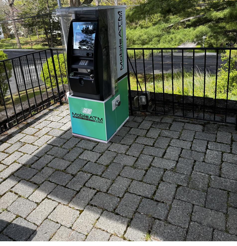 Single ATM rental for a private event, placed under a canopy on a stone patio
